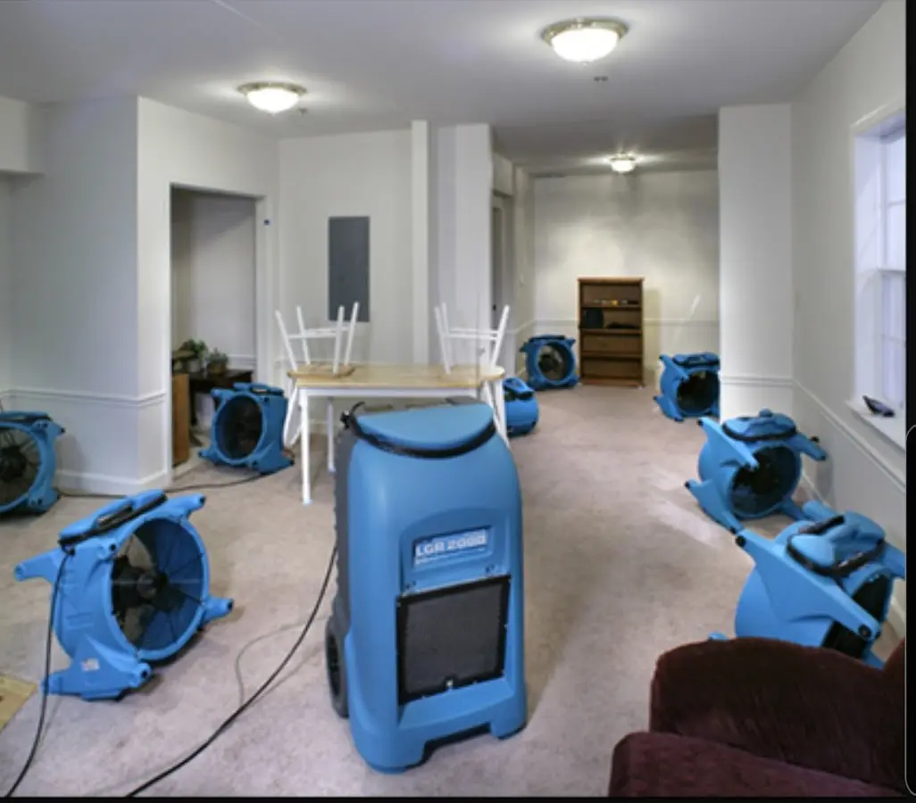Air movers and dehumidifier setup for Water Damage Restoration in Pocahontas